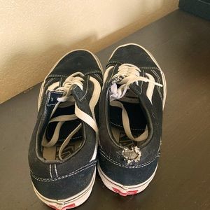 Vans , size 8 men, 9.5 woman, small cat bite